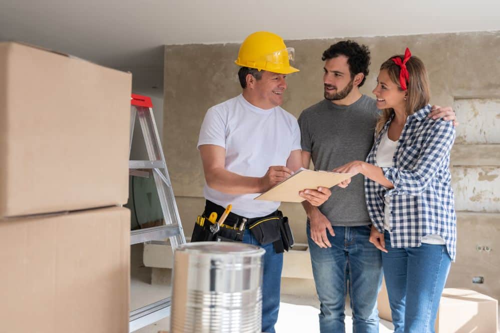a couple working with a professional basement remodeler