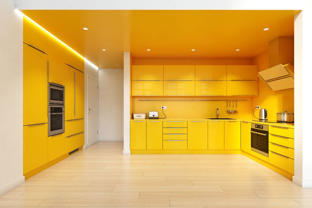brightly colored yellow kitchen