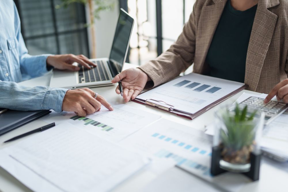 two-persons-reviewing-timbertech-deck-contractors-documents