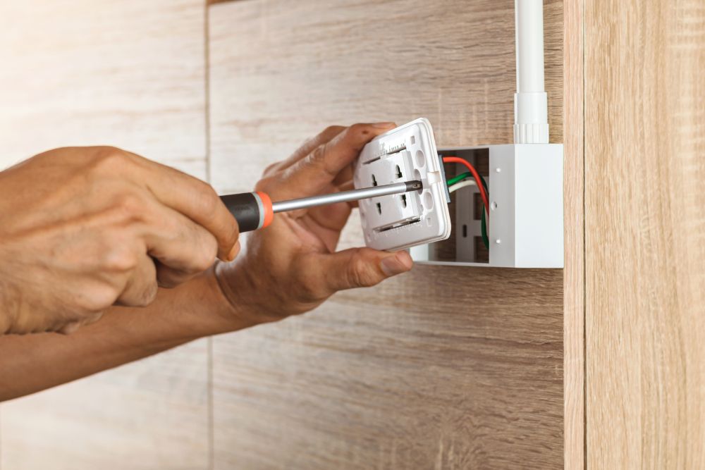 installation of a bathroom wall electrical outlet