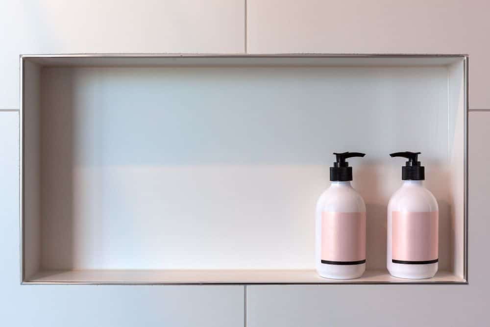 shower niche with shampoo bottles