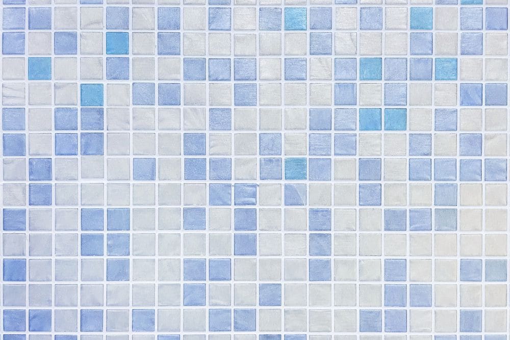blue and white mosaic tiles with white grout lines