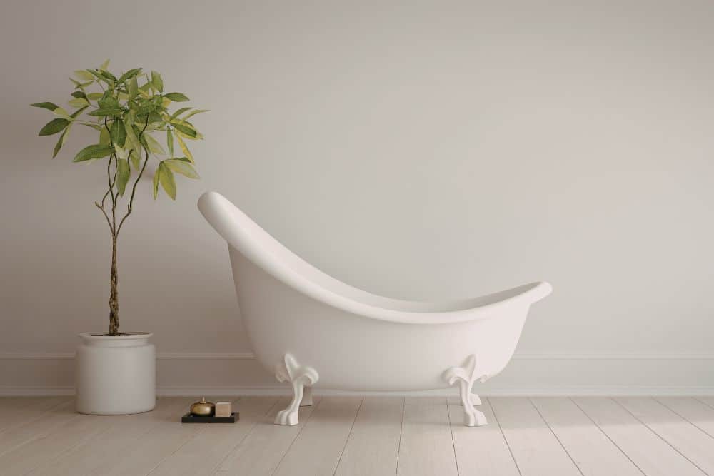 white modern clawfoot tub against a light background