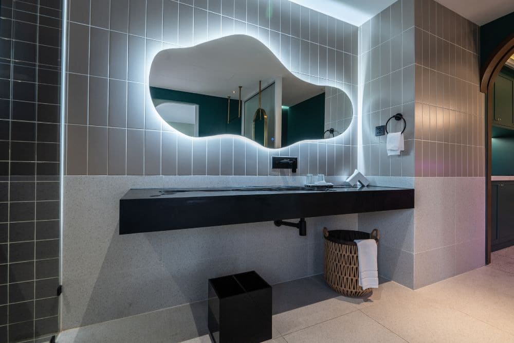 organic-shaped mirror, one of the top bathroom remodeling trends in 2026