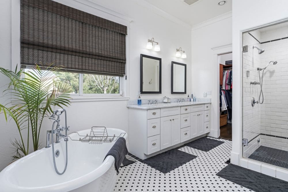 a jack and jill bathroom featuring an open-concept layout.