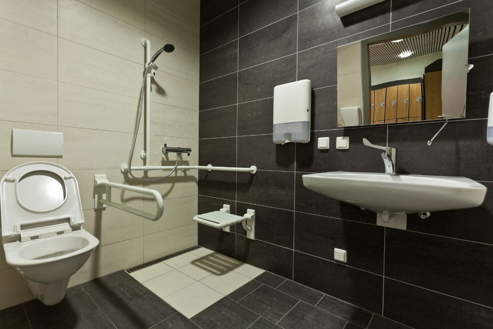 a bathroom with newly installed accessibility features, an example of a project that may need bathroom remodel financing