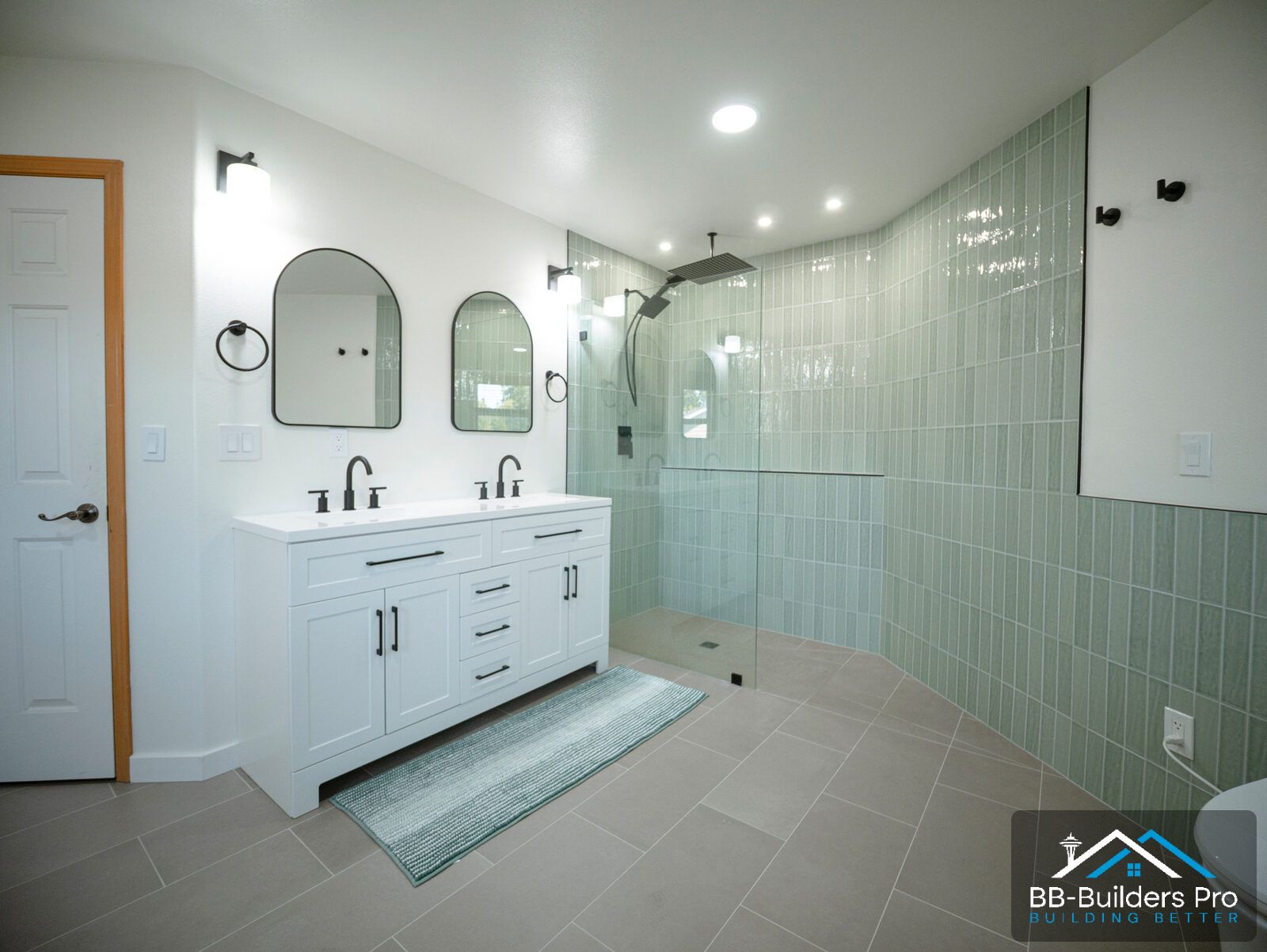 custom tile walk-in shower and double vanity after a bathroom remodel by bb-builders pro