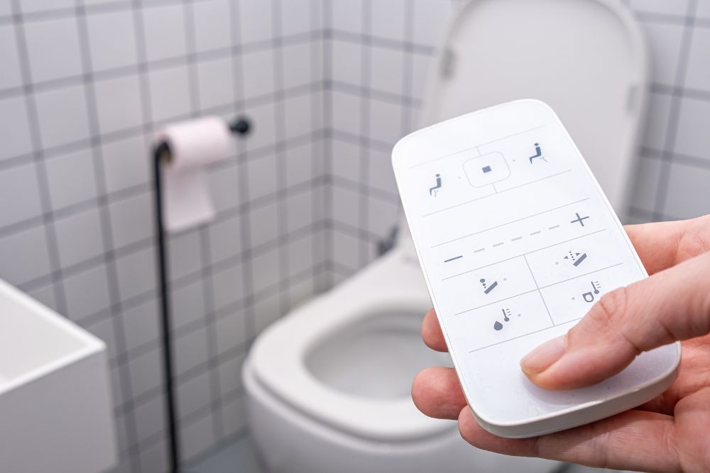 remote-controlled smart toilet featuring a smart bidet system, often considered a luxury smart bathroom technology
