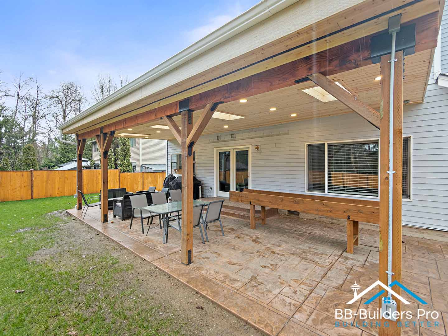 covered patio with dining area for year-round outdoor living in the seattle area