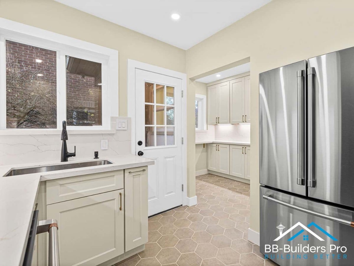 kitchen remodel timeline bellevue - white shaker cabinets and stainless refrigerator after install