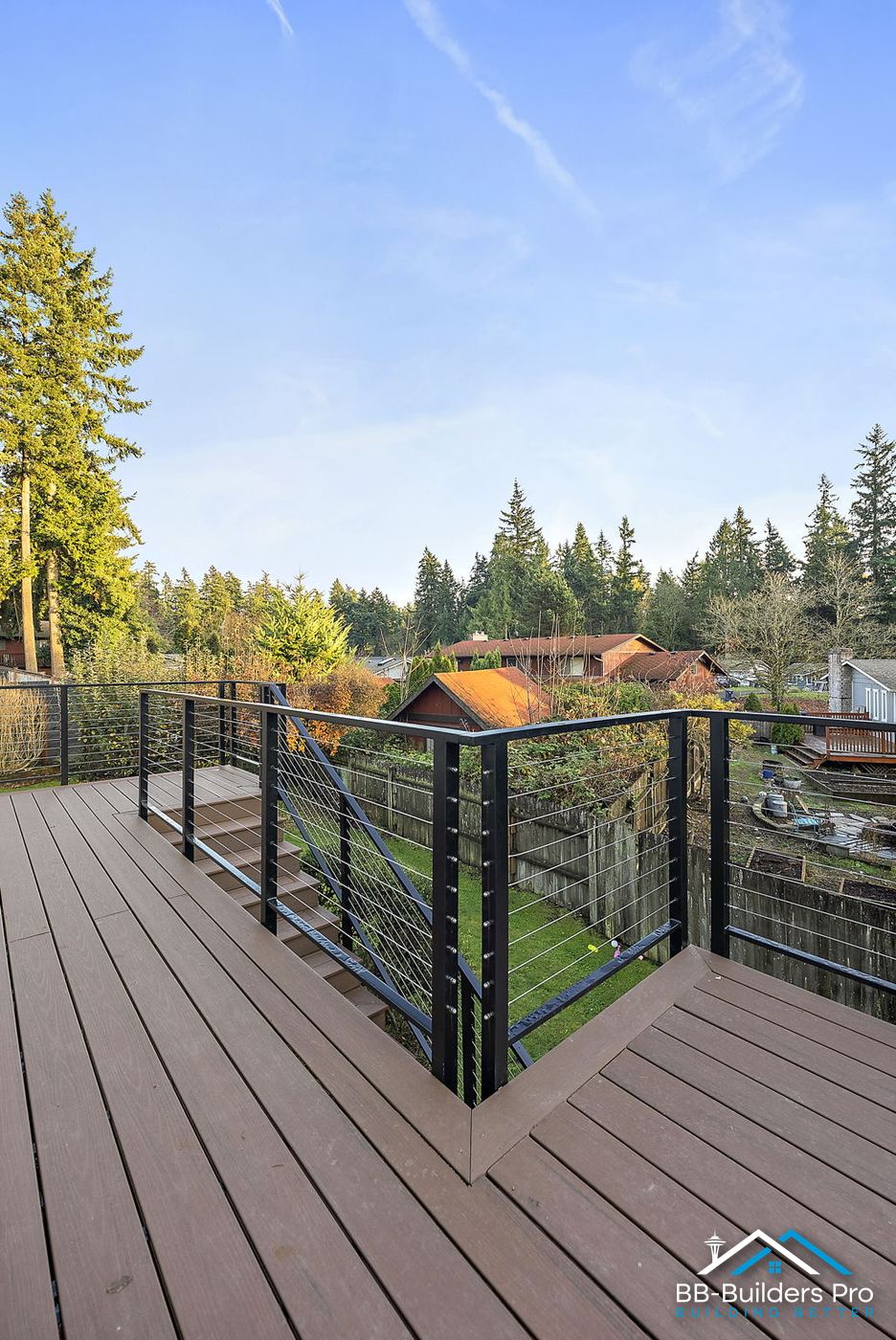 elevated composite deck with cable railing in bellevue, wa