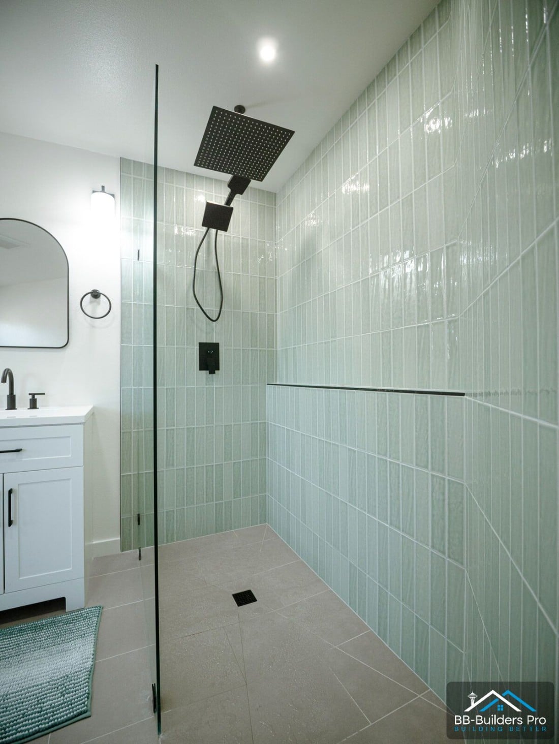 curbless tile shower floor with a linear drain in a seattle bathroom